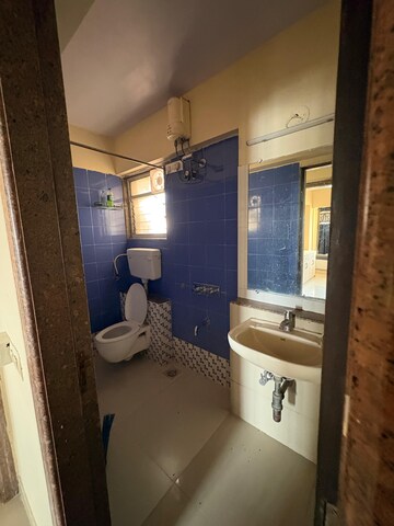 Bathroom in 2 BHK Apartment at Kanakia Spaces Niharika, Manpada – for Rent