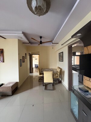 Living Room in 2 BHK Apartment at Kanakia Spaces Niharika, Manpada – for Rent