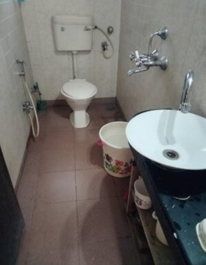 Bathroom in 2 BHK Apartment at Ramnath Prasad Apartment, Khar West – for Sale