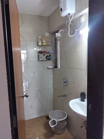 Bathroom in 1 BHK Apartment at Raunak Bliss, Ghodbunder Road – for Rent