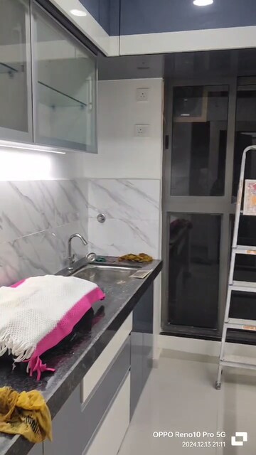 Kitchen in 2 BHK Apartment at Lokhandwala Vinay Tower, Kandivali East – for Sale