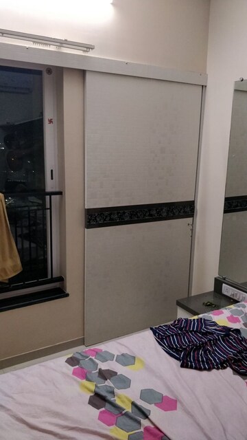 Living Room in 2 BHK Apartment at Rustomjee Azziano Wing D, Thane West – for Sale