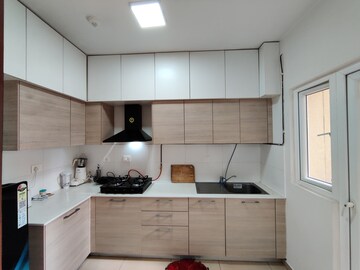Kitchen in 2 BHK Apartment at Bhartiya Nikoo Homes Phase 2, Thanisandra Main Road – for Rent