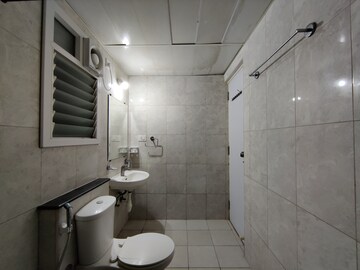 Bathroom in 3 BHK Apartment at Mantri Webcity, Hennur – for Rent