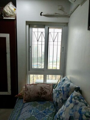 Bedroom in 1.5 BHK Apartment at Dosti West County, Balkum Pada – for Rent
