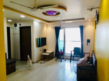 Living Room in 1.5 BHK Apartment at Dosti West County, Balkum Pada – for Rent