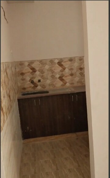 Kitchen in 2 BHK Apartment at Amrapali Golf Homes, Sector 4 Greater Noida – for Rent