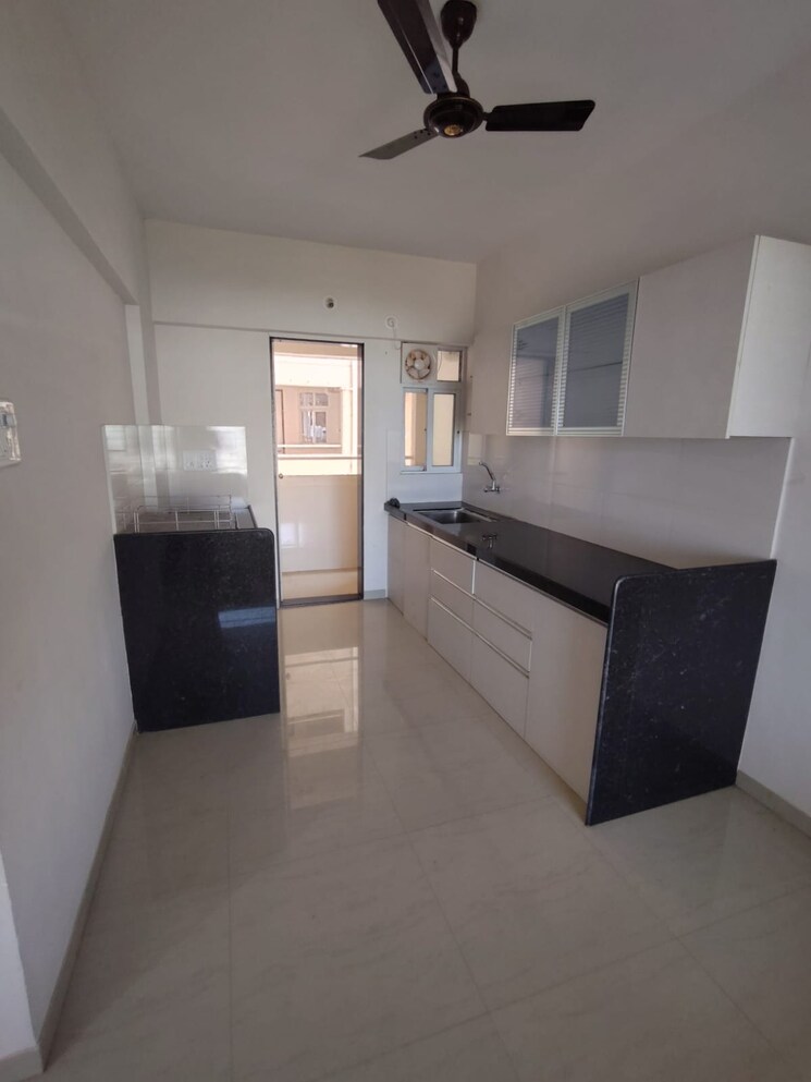 Kitchen, pandit-javdekar-red-earth 2 Bedroom 923 Sq.Ft. Apartment In Pirangut Pune 9552363