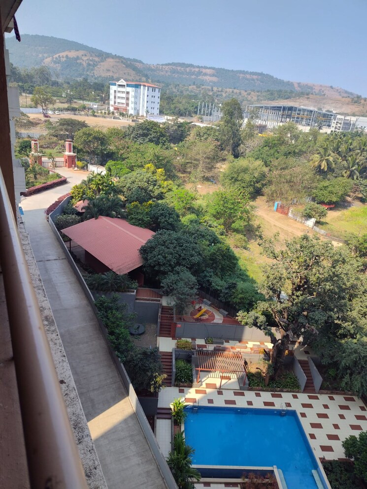 Swimming Pool, pandit-javdekar-red-earth 2 Bedroom 923 Sq.Ft. Apartment In Pirangut Pune 9552363