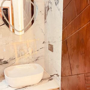 Bathroom in 2 BHK Apartment at Exotica Elegance, Ahinsa Khand 2 – for Rent