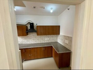 Kitchen in 2 BHK Apartment at RG Luxury Homes, Sector 16b Greater Noida – for Rent