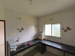 Kitchen in 2 BHK Apartment at Bhilarewadi – for Sale