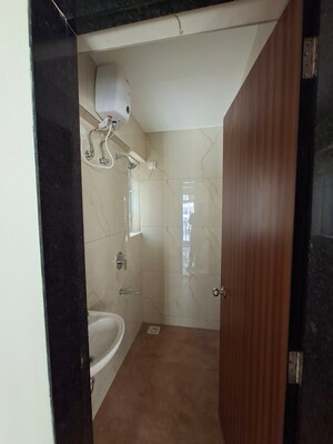 Bathroom in 1 BHK Apartment at Raunak Delight, Owale – for Sale