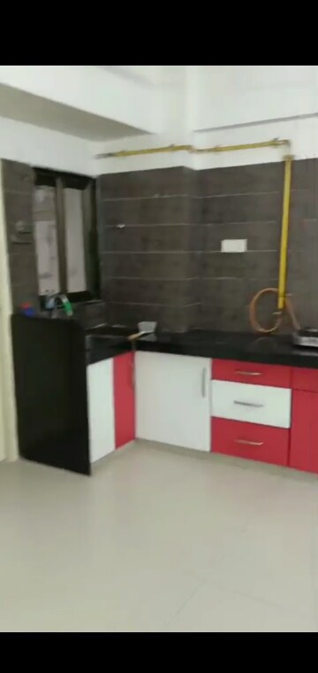 Kitchen in 2 BHK Apartment at Savvy Solaris, Motera – for Rent