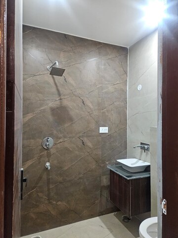 Bathroom in 3 BHK Apartment at Dhakoli – for Sale