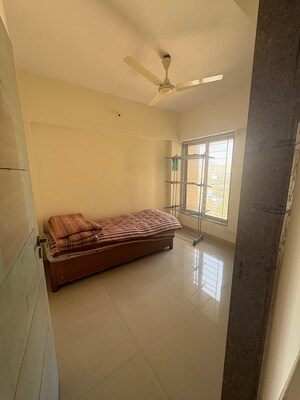 Bedroom in 2 BHK Apartment at Kanakia Spaces Niharika, Manpada – for Rent