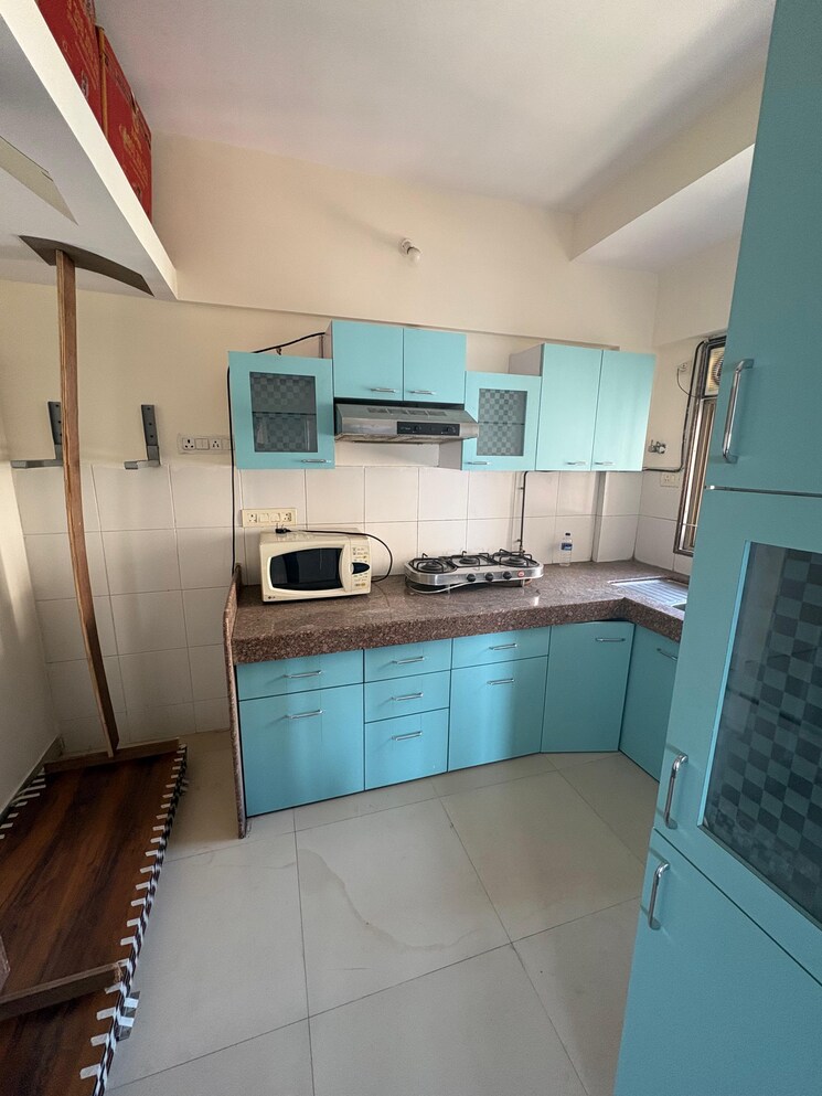 Kitchen, kanakia-spaces-niharika 2 Bedroom 850 Sq.Ft. Apartment In Manpada Thane 9552740