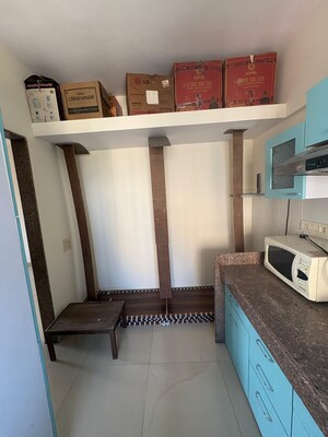 Kitchen in 2 BHK Apartment at Kanakia Spaces Niharika, Manpada – for Rent