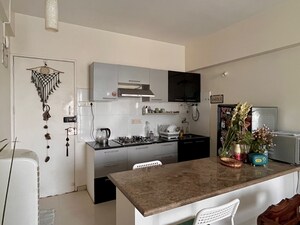 Kitchen in 1 BHK Apartment at Maple Wood, Kalyani Nagar – for Rent