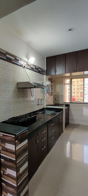 Kitchen in 2 BHK Apartment at Atul Alcove, Pimple Saudagar – for Sale