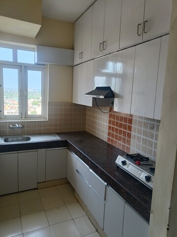 Kitchen in 2 BHK Apartment at Shree Vardhman Mantra, Sector 67 – for Rent