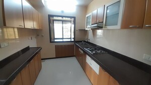 Kitchen in 2 BHK Apartment at Nav Sanyukt CHS, Andheri East – for Rent