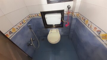 Bathroom in 2 BHK Apartment at Nav Sanyukt CHS, Andheri East – for Rent
