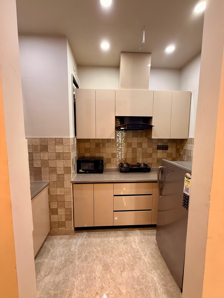 Kitchen, the-grand 1 Bedroom 850 Sq.Ft. Builder Floor In Sector 52 Gurgaon 9553046