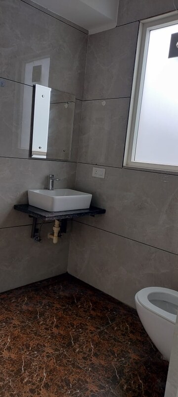 Bathroom in 1 RK Builder Floor at Ambience Mall, Sector 24 – for Rent
