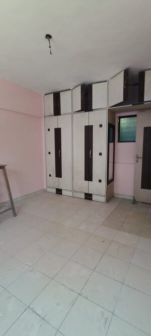 Bedroom in 1 BHK Apartment at Ramkunj CHS , Ganeshwadi – for Rent