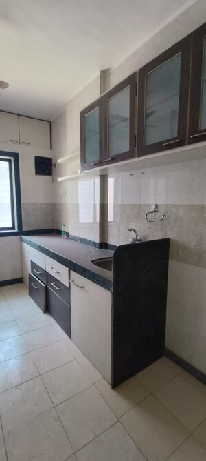 Kitchen in 1 BHK Apartment at Ramkunj CHS , Ganeshwadi – for Rent