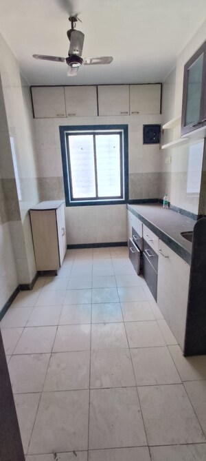 Kitchen in 1 BHK Apartment at Ramkunj CHS , Ganeshwadi – for Rent