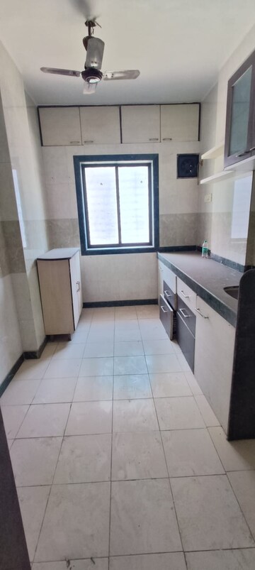 Kitchen in 1 BHK Apartment at Ramkunj CHS , Ganeshwadi – for Rent
