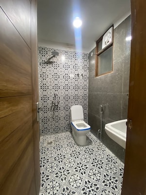 Bathroom in 2 BHK Builder Floor at Chattarpur – for Rent