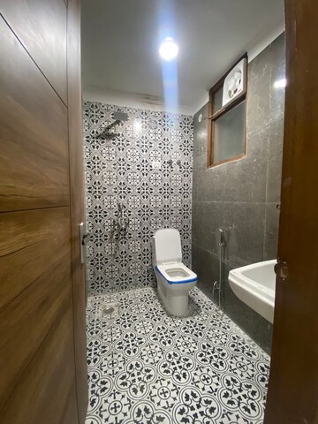 Bathroom in 2 BHK Builder Floor at Chattarpur – for Rent