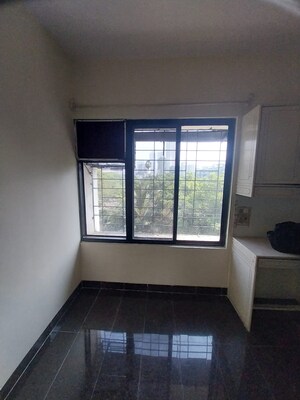 Room in 2 BHK Apartment at Raj Villa CHS, Borivali West – for Rent