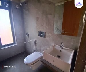 Bathroom in 3 BHK Apartment at Omkar Alta Monte, Malad East – for Sale