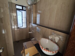 Bathroom in 3 BHK Apartment at Omkar Alta Monte, Malad East – for Sale