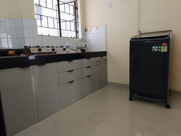 Kitchen in 1 BHK Apartment at Mantri Aangan, Koregaon Park – for Rent