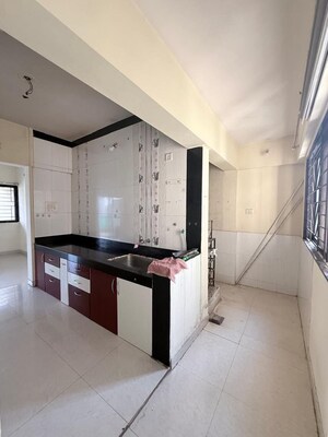 Kitchen in 2 BHK Apartment at Magarpatta City Roystonea, Hadapsar – for Sale