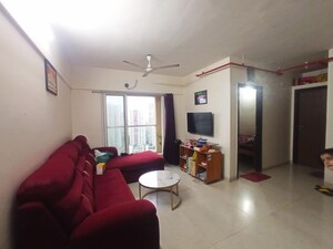Living Room in 2 BHK Apartment at Dosti West County, Balkum Pada – for Sale