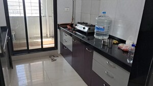 Kitchen in 2 BHK Apartment at Sawan Highness, Kharghar – for Rent
