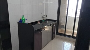 Kitchen in 2 BHK Apartment at Sawan Highness, Kharghar – for Rent