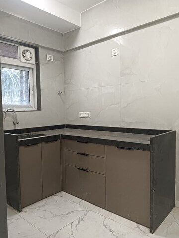 Kitchen in 2 BHK Apartment at Om Ganesh CHS, Vikhroli East – for Sale