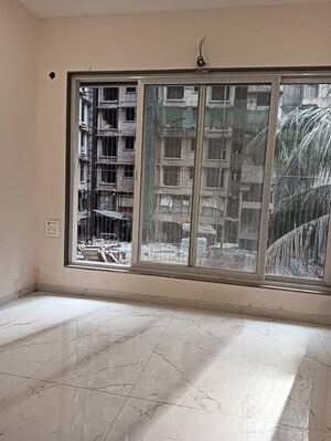 Room in 2 BHK Apartment at Om Ganesh CHS, Vikhroli East – for Sale