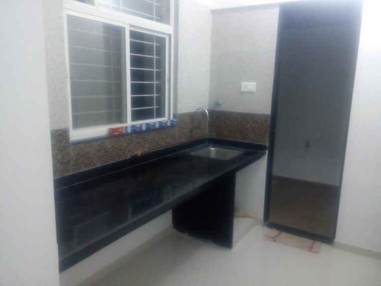 Kitchen, wakad 2 Bedroom 870 Sq.Ft. Apartment In Wakad Pune 9553440