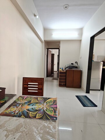 Living Room in 1 BHK Apartment at Andheri CHS, Andheri West – for Sale