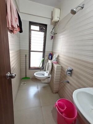 Bathroom in 1 BHK Apartment at Andheri CHS, Andheri West – for Sale