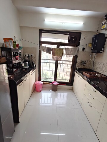 Kitchen in 1 BHK Apartment at Andheri CHS, Andheri West – for Sale