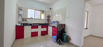 Kitchen in 2 BHK Apartment at Gera World of Joy, Kharadi – for Rent